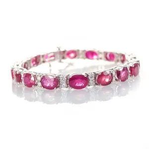 26 Carat Ruby Oval and Diamond Tennis Bracelet in 18k White Gold