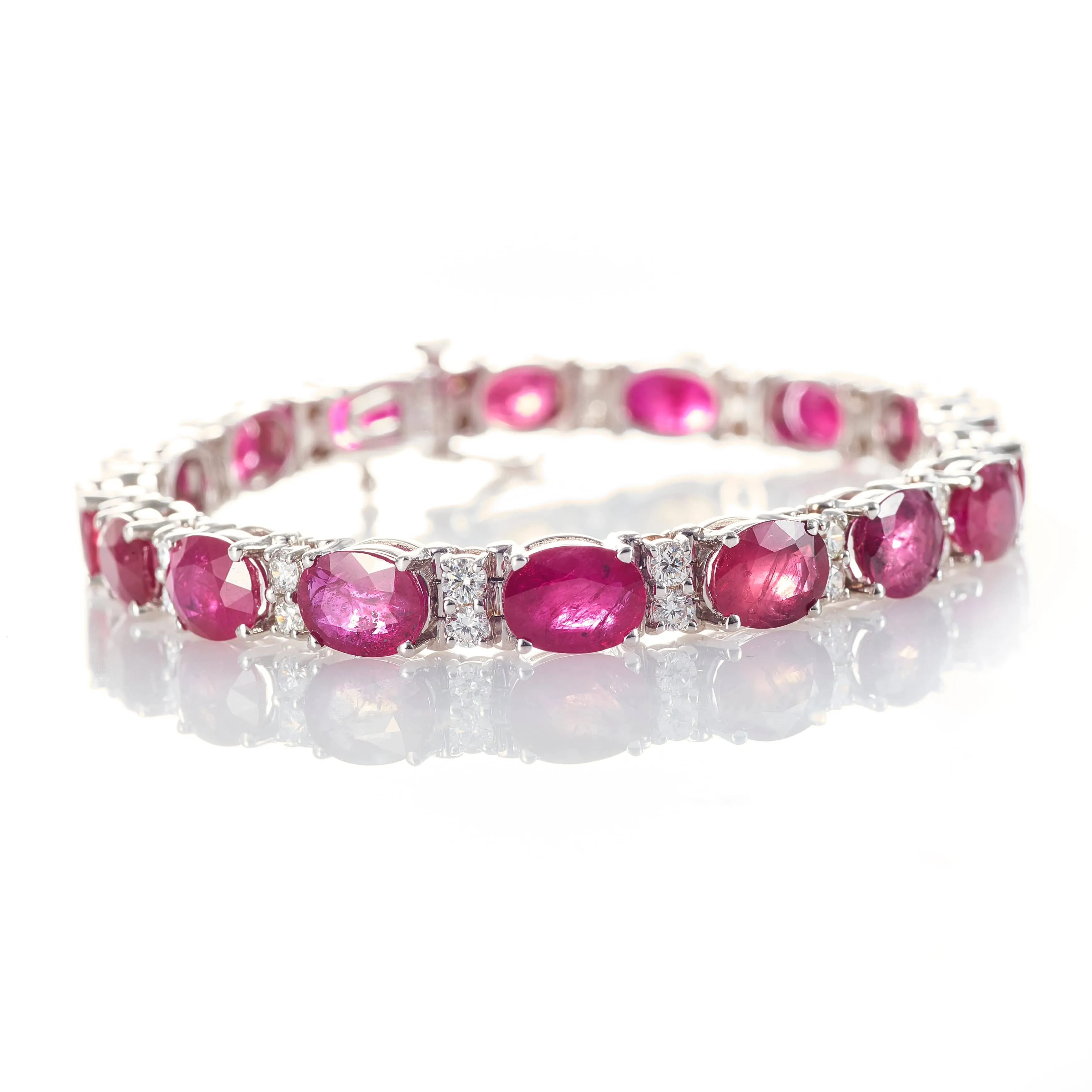 26 Carat Ruby Oval and Diamond Tennis Bracelet in 18k White Gold