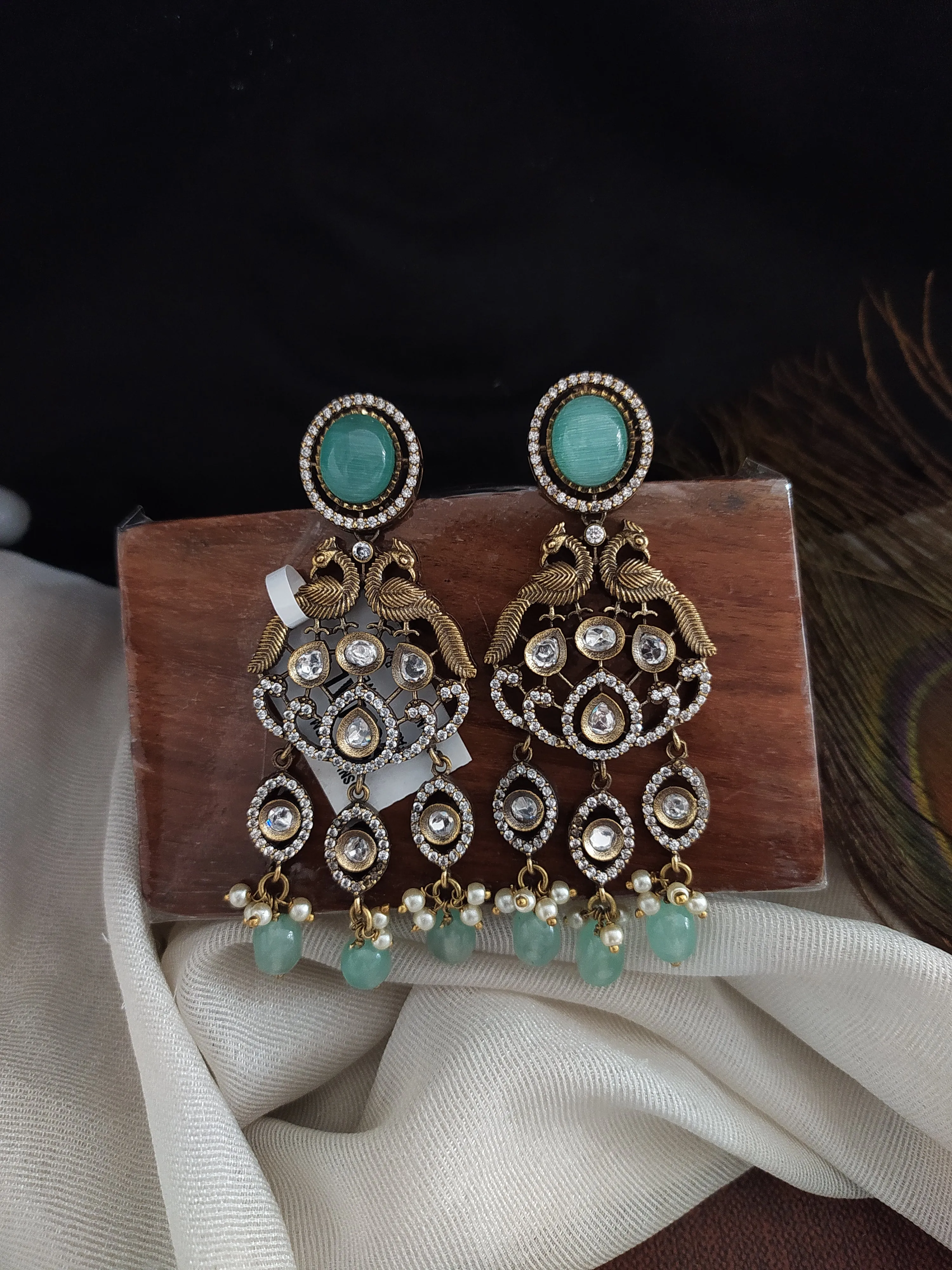 Alluring Peacock Design Dangler Earrings