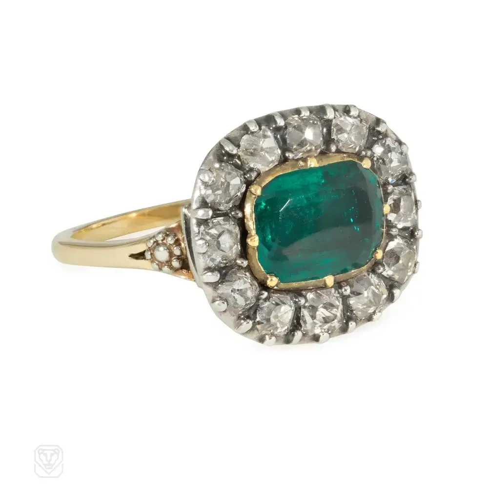 Antique emerald and diamond cluster ring