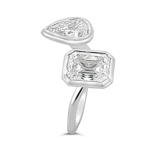 Emerald cut & Pear Shaped Diamond Ring