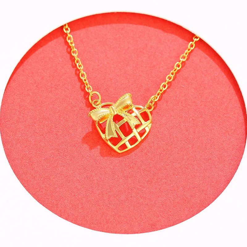 Jewelry plated 24K gold bow hollow love necklace  women's summer temperament clavicle chain