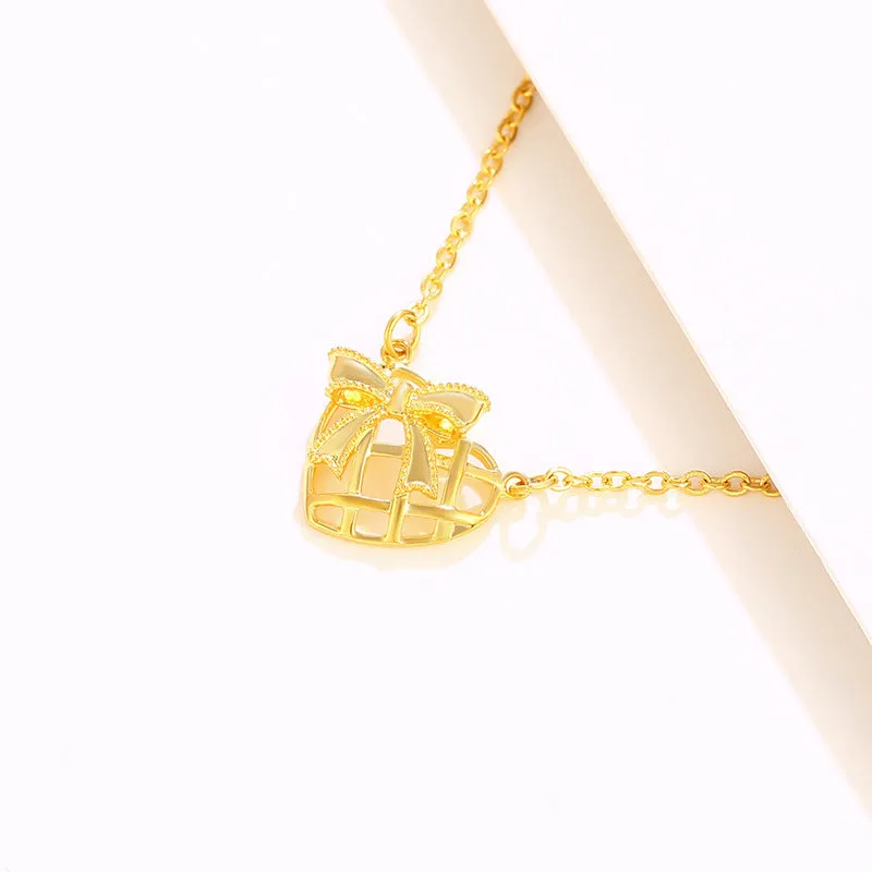 Jewelry plated 24K gold bow hollow love necklace  women's summer temperament clavicle chain