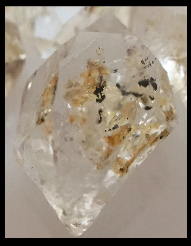 Small Double Terminated Quartz with Petroleum Inclusions