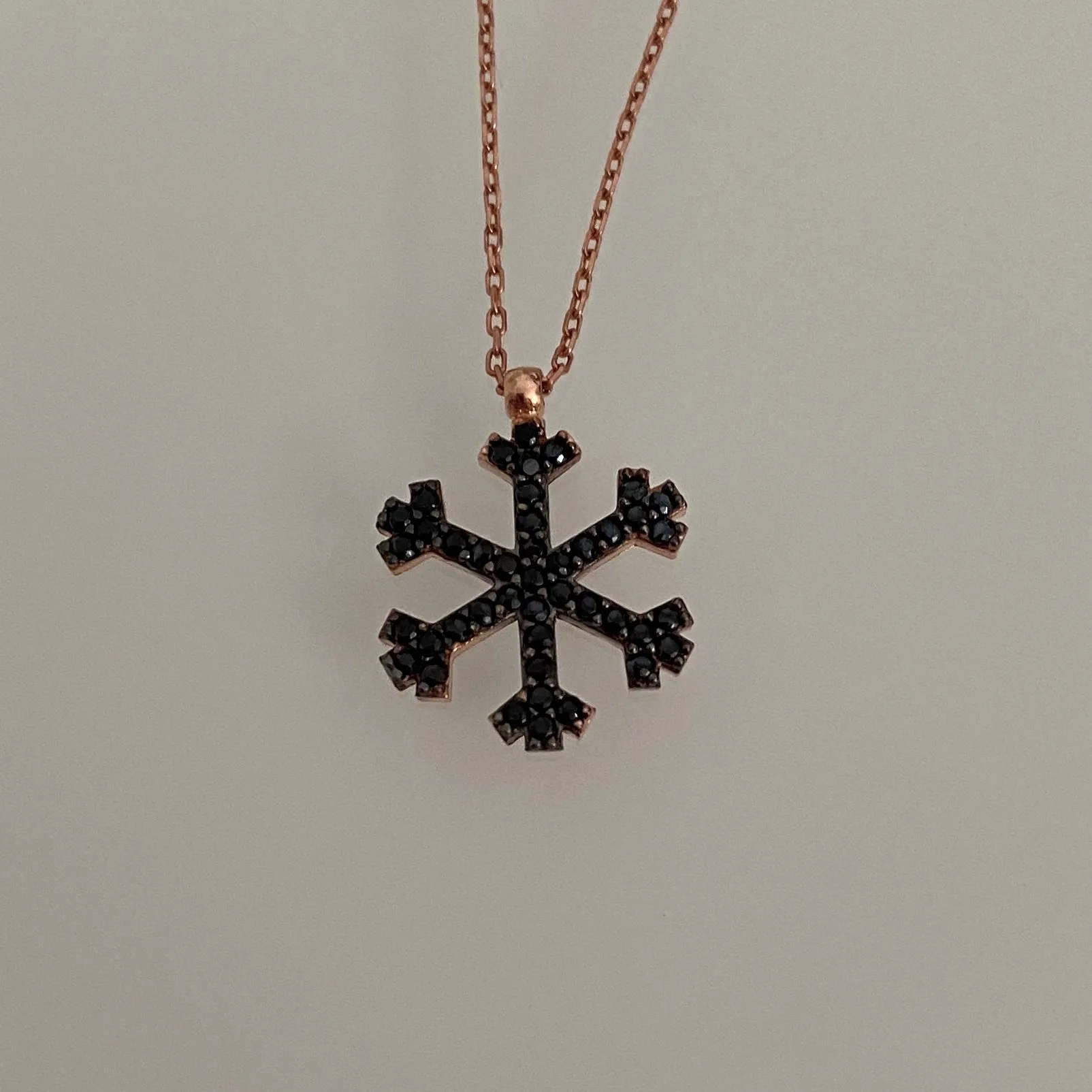 Snowflake With Black Stones